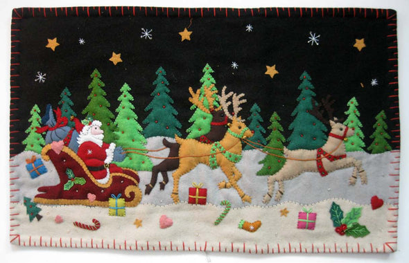 Black Pillow with Reindeer Pulling Santa's Sleigh